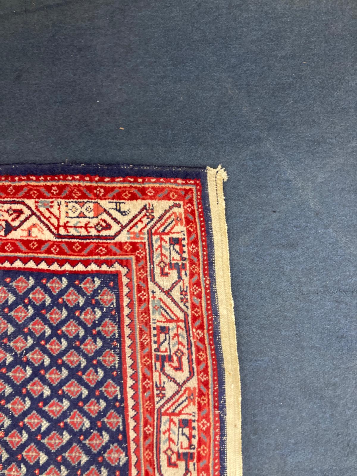 A North West Persian blue ground rug, 160 x 100cm